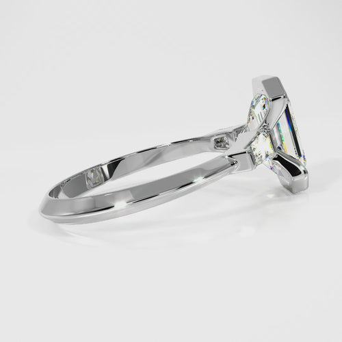 Emerald Cut Three-Stone Engagement Ring with Trapezoid Side Stones