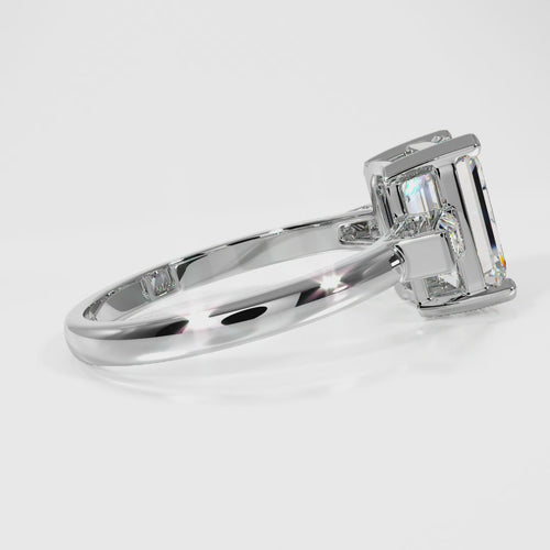 3 Stone Emerald Cut Diamond ring with Trapezoid side stones Engagement Ring